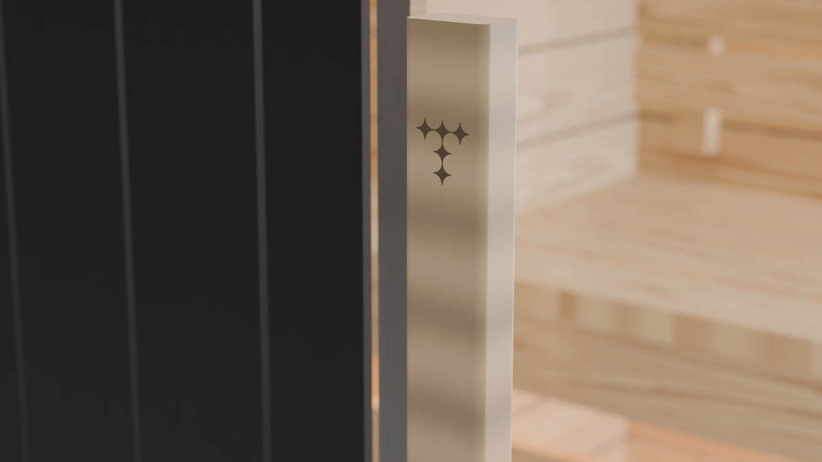 The Ounas spruce door pull with the TUNDRA logo mark laser-engraved near its top
