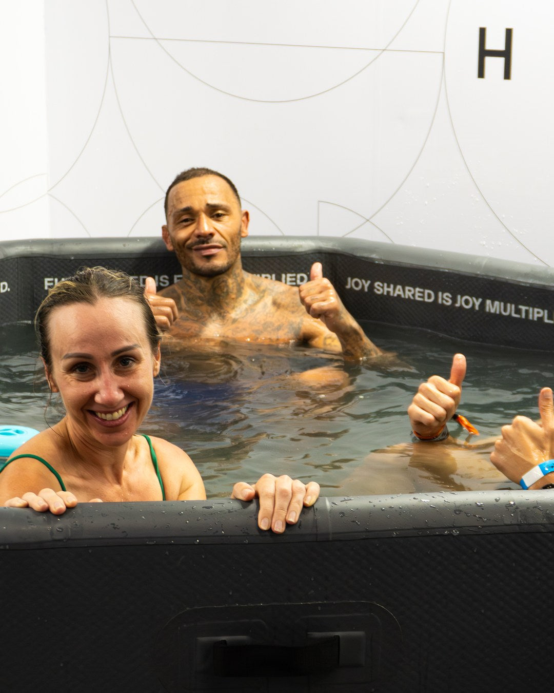 Group of racers in a TUNDRA cold plunge at HYROX Bangkok 2026