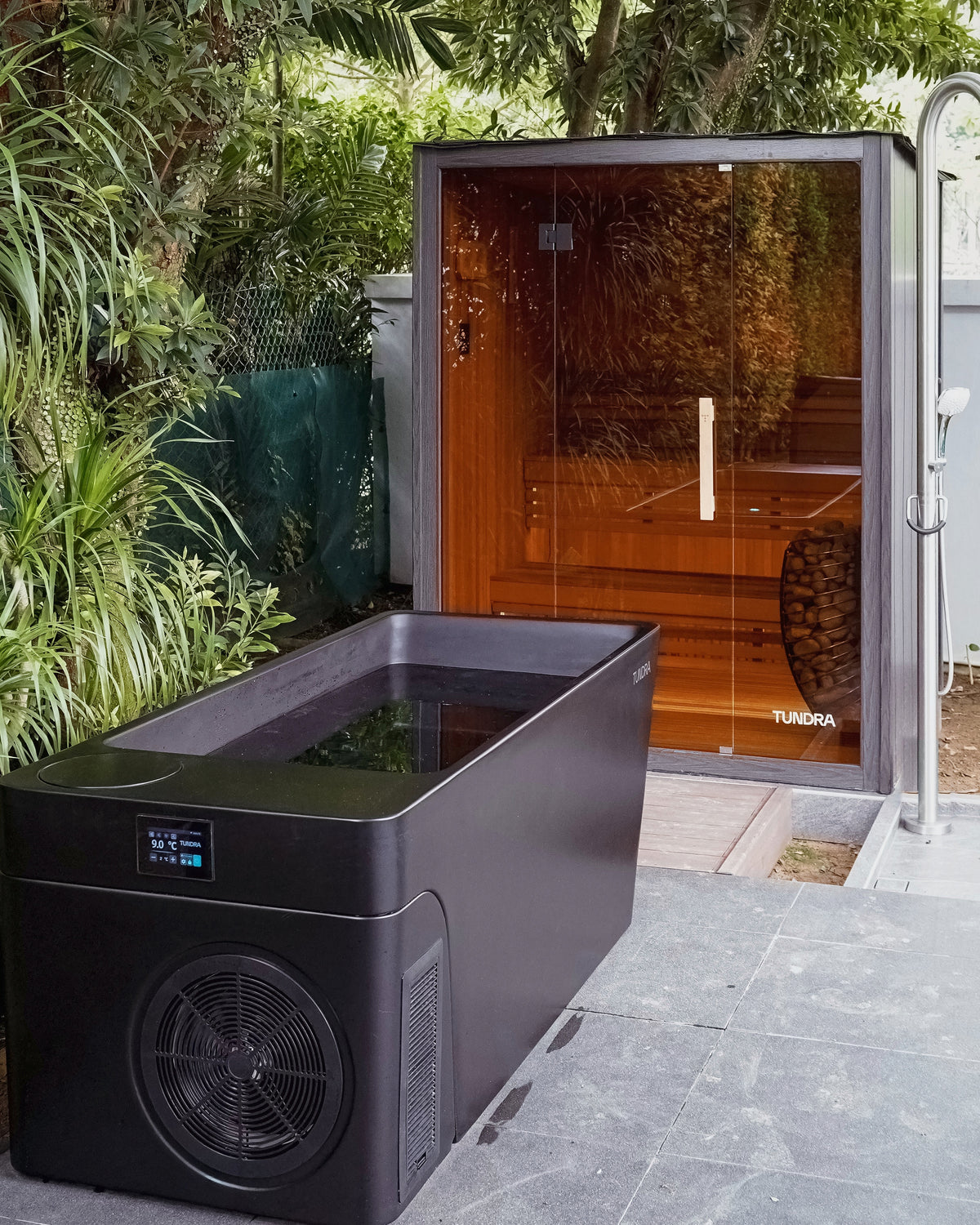 A Haven sauna and a Taiga plunge installed in a garden in Singapore