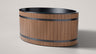 The TUNDRA Inari two person oval cold plunge, three quarter view, black stainless steel interior and WPC oak woodgrain cladding