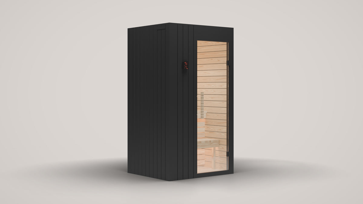 The Ounas for two, three quarter front left view: black vertical timber boards on the front and sides