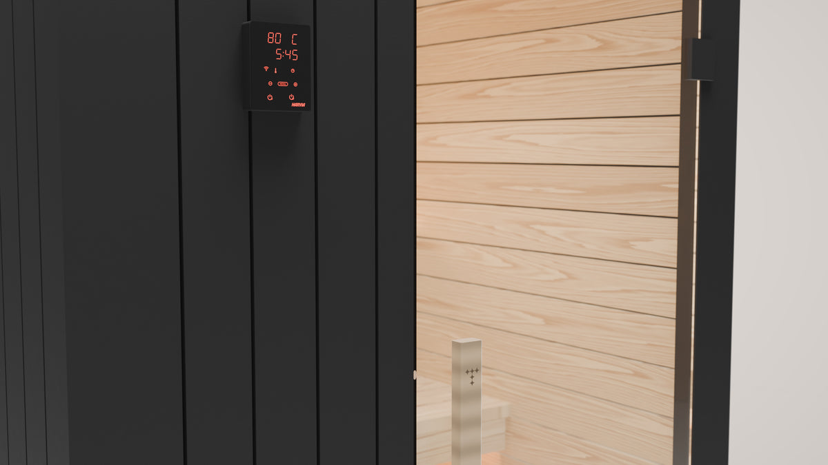 Harvia Xenio control panel on the black front panel beside the glass door, spruce interior behind the glass