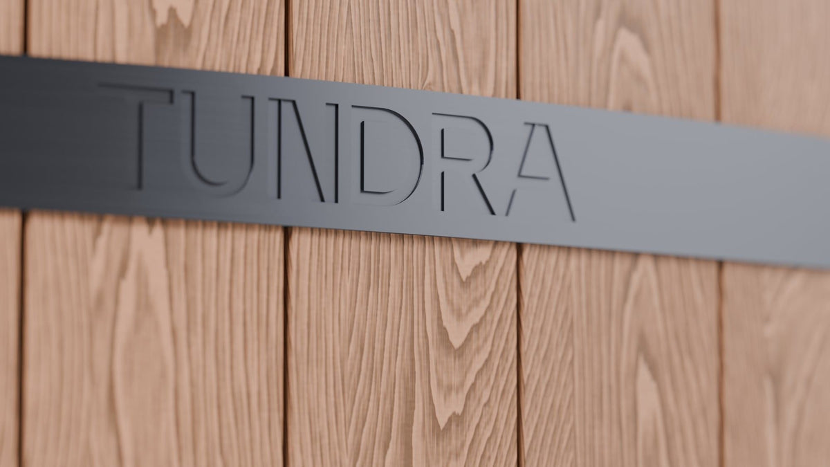 The engraved TUNDRA band on the Inari cladding